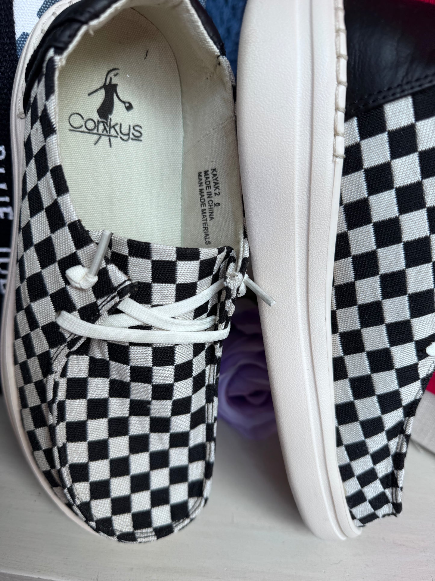 Corky’s Black and White Checkered Kayaks
