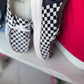 Corky’s Black and White Checkered Kayaks