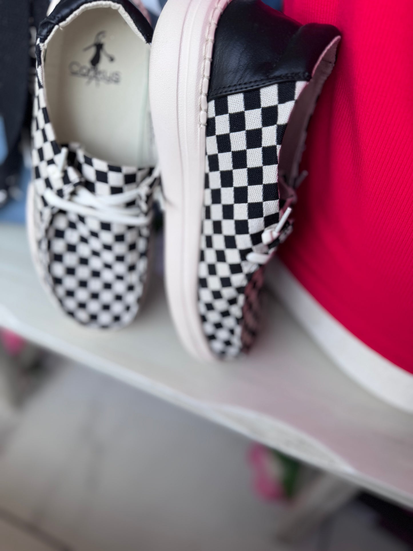 Corky’s Black and White Checkered Kayaks