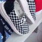 Corky’s Black and White Checkered Kayaks